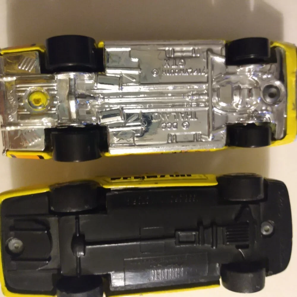 2002 Golden Wheel and 2004 Hot Wheels car